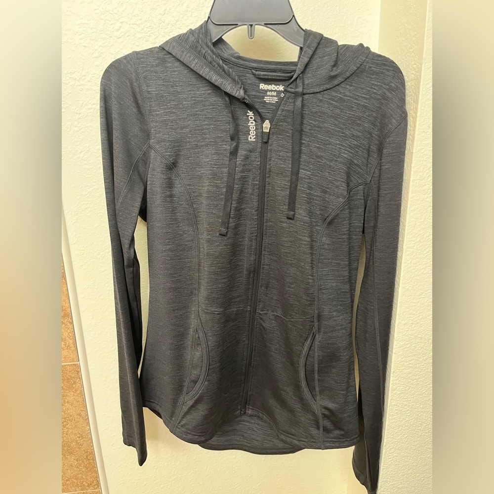 Reebok athletic zip up jacket.